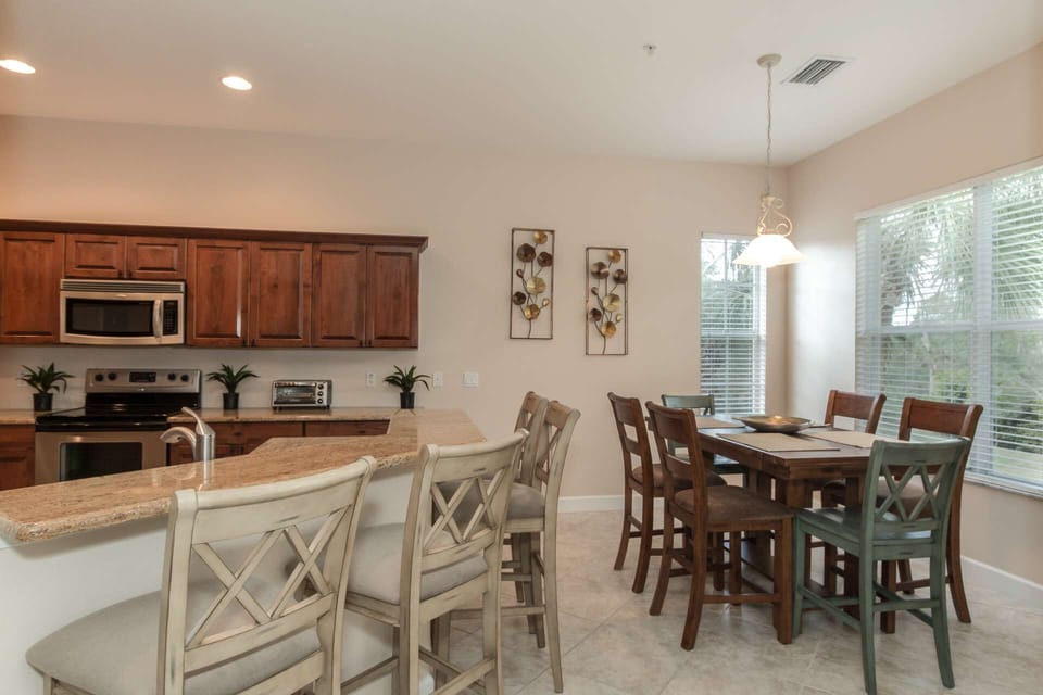 Enjoy meals gathered round the kitchen or in the adjacent morning room overlooking the preserve
