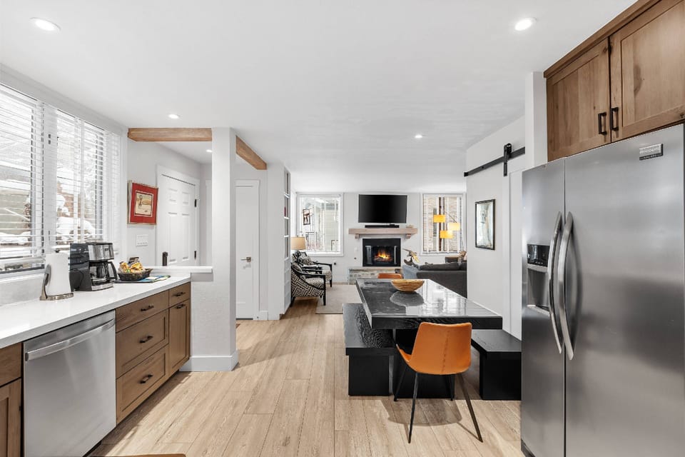 The main level features the living area, full size laundry, full kitchen and a king bedroom and bathroom.