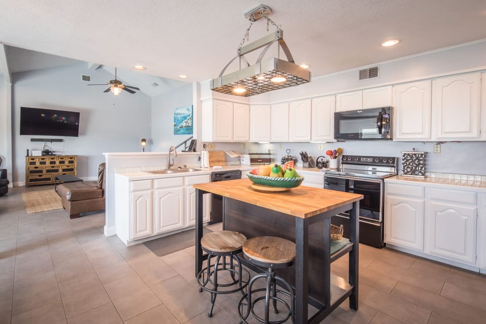 Kitchen equipped with all cooking and dining essentials