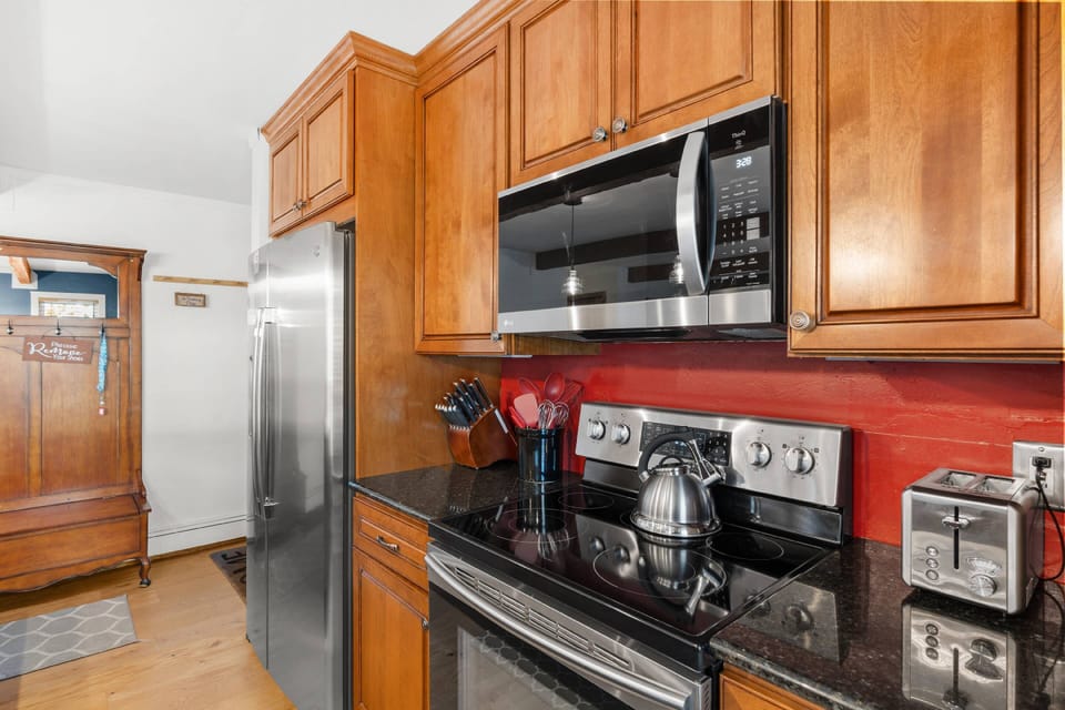 A fully stocked kitchen makes it easy to dine at home during your stay.