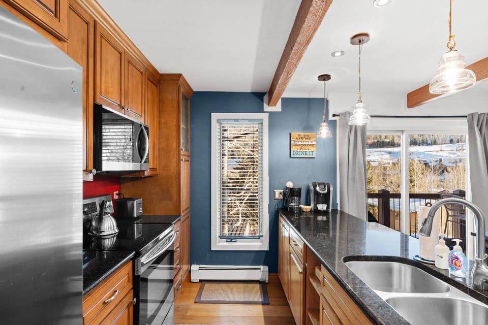 Enjoy the view outside while fixing breakfast in this modern updated kitchen.