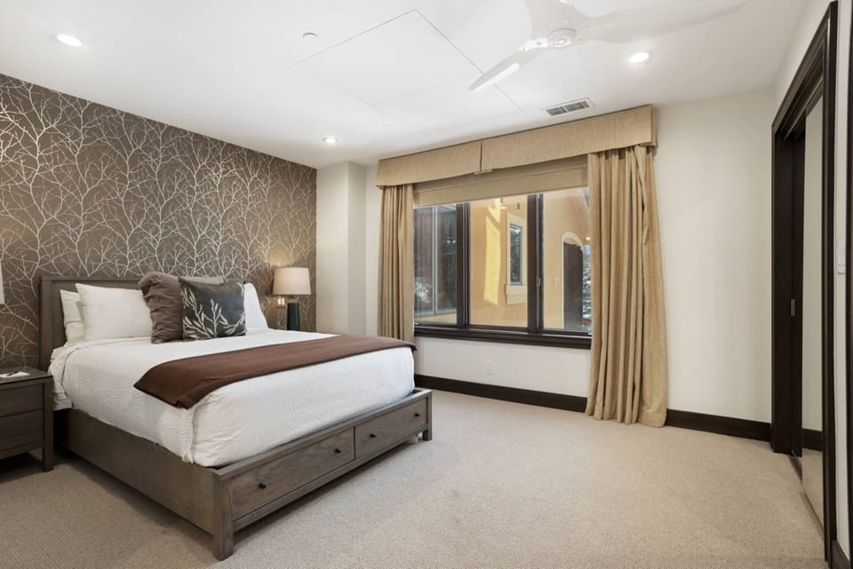 Guest bedroom 3 featuring a comfy queen bed for a restful night's sleep.