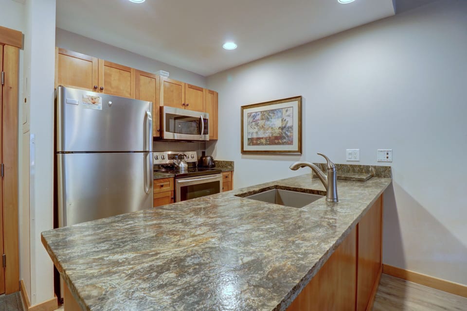 Nicely updated kitchen with stainless steel appliances.
