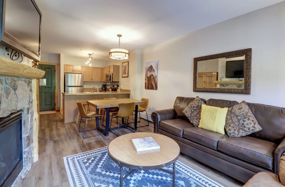 Open concept living, dining, and kitchen area.
