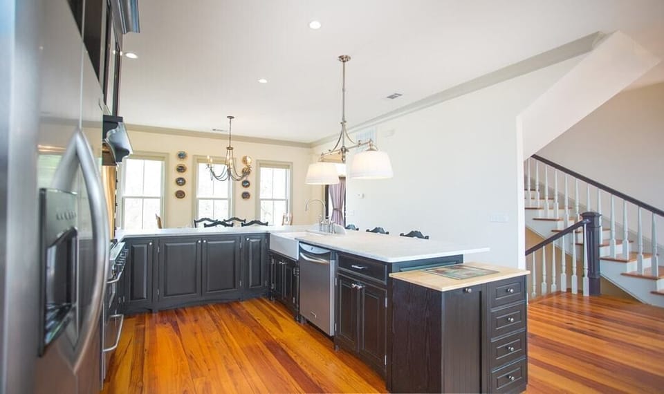 Open space between the dining room and the kitchen make it easy for everyone to be in one place at one time.