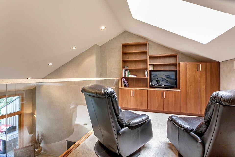 Upstairs master den with flat screen TV.