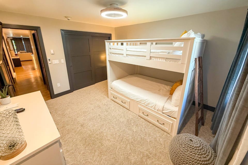 Guest Bedroom 3 features a full over full bunk bed.