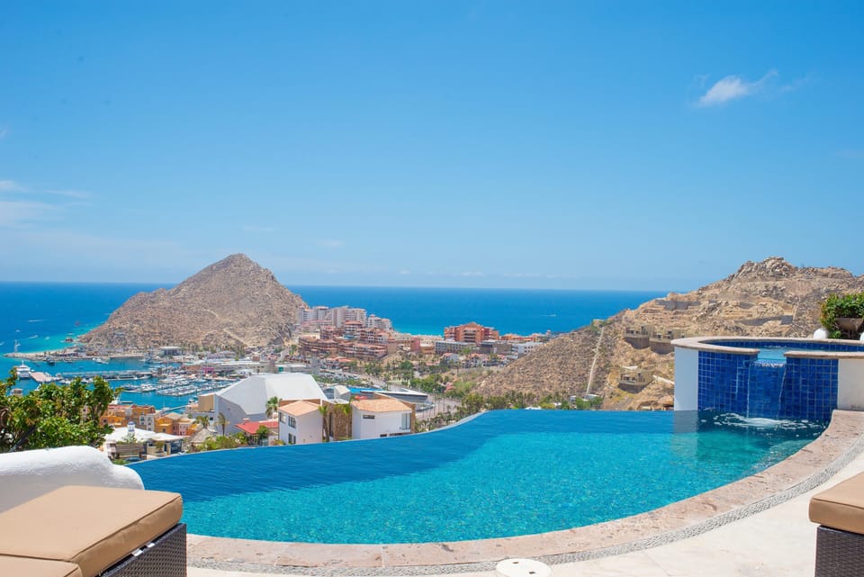 Infinity edge pool leads eye to marina view