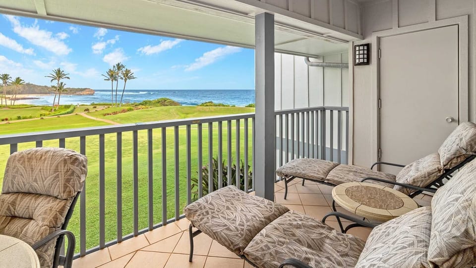 Poipu Sands at Poipu Kai Resort #523 - Shipwrecks Beach Covered Lounging Lanai View - Parrish Kauai