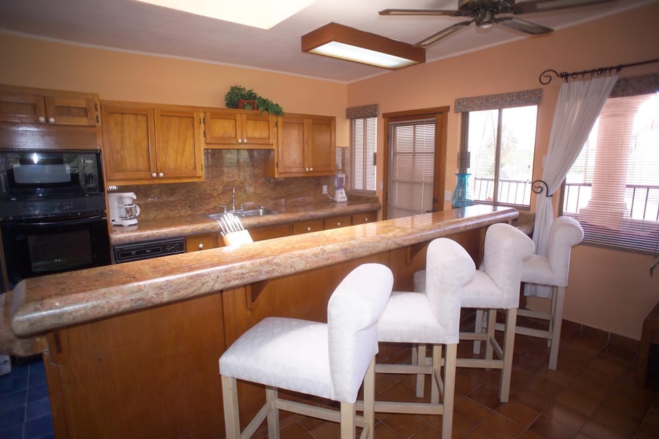 Large kitchen with bar seating