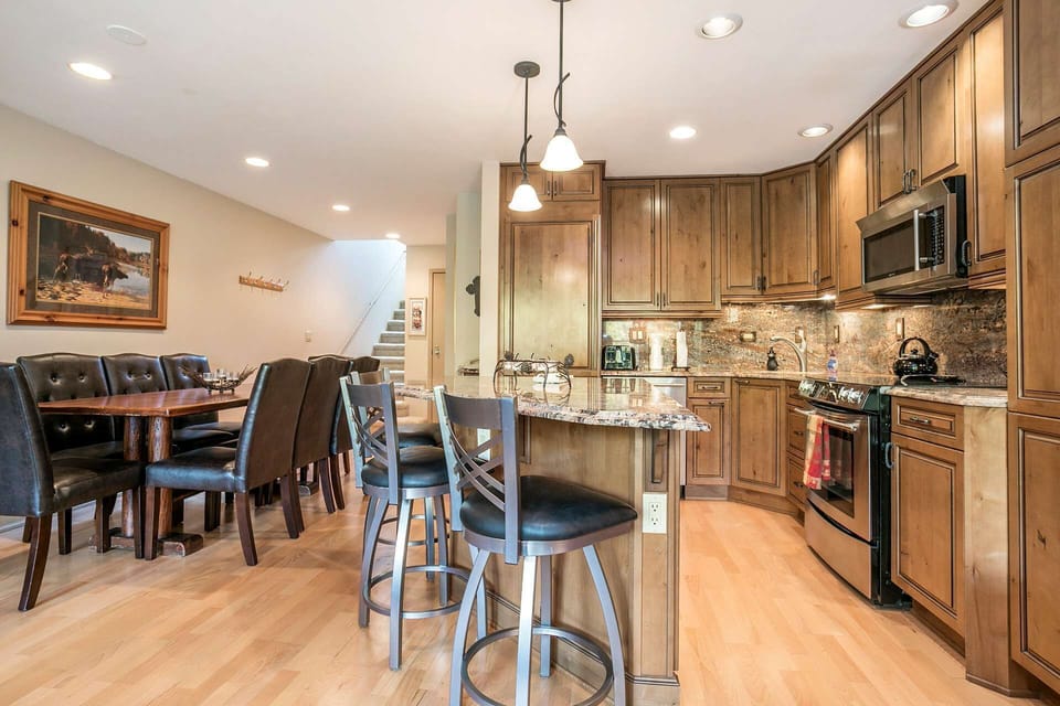 Plan your adventures at the breakfast bar with seating for 3.