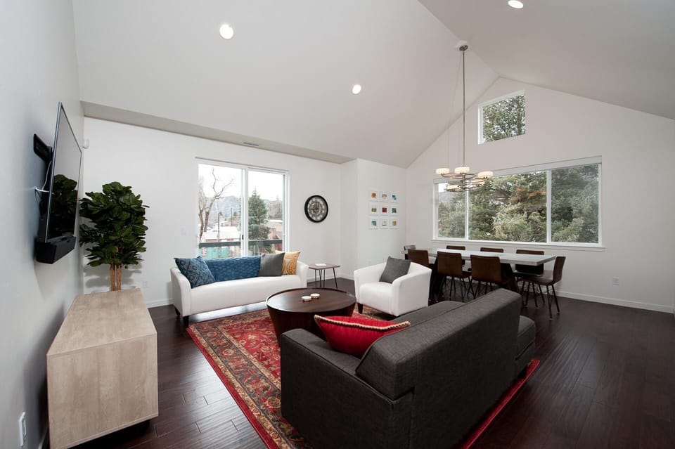 Living room with TV and dining area