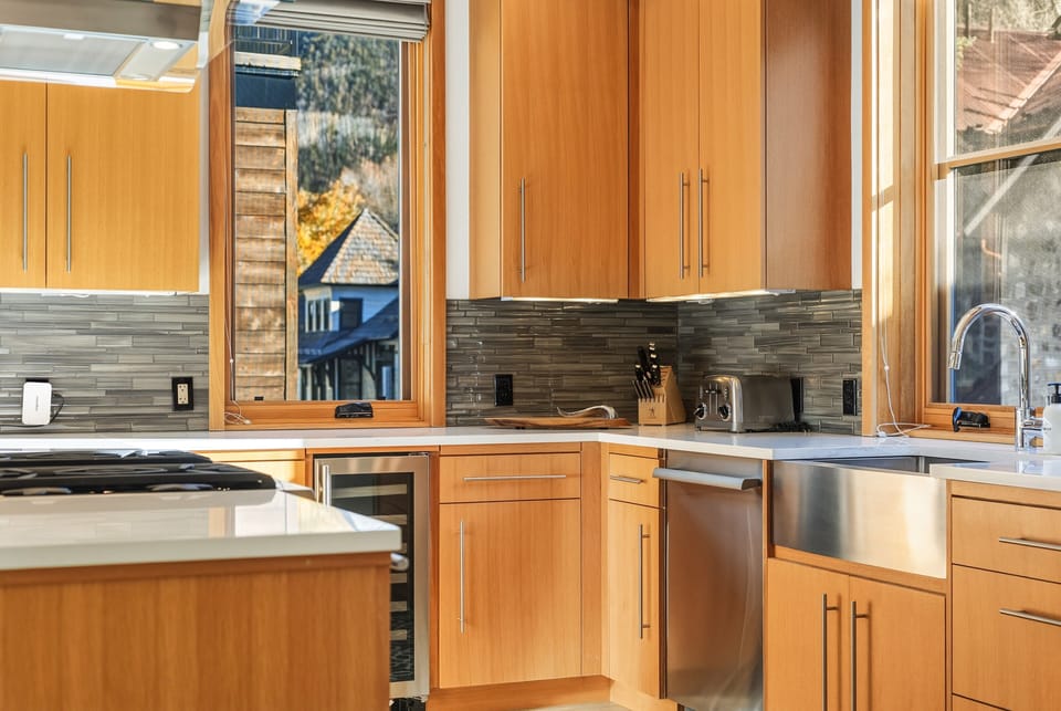 The kitchen is a luxurious, state-of-the-art space with all modern appliances and everything you need to create culinary delights, all while enjoying stunning views.