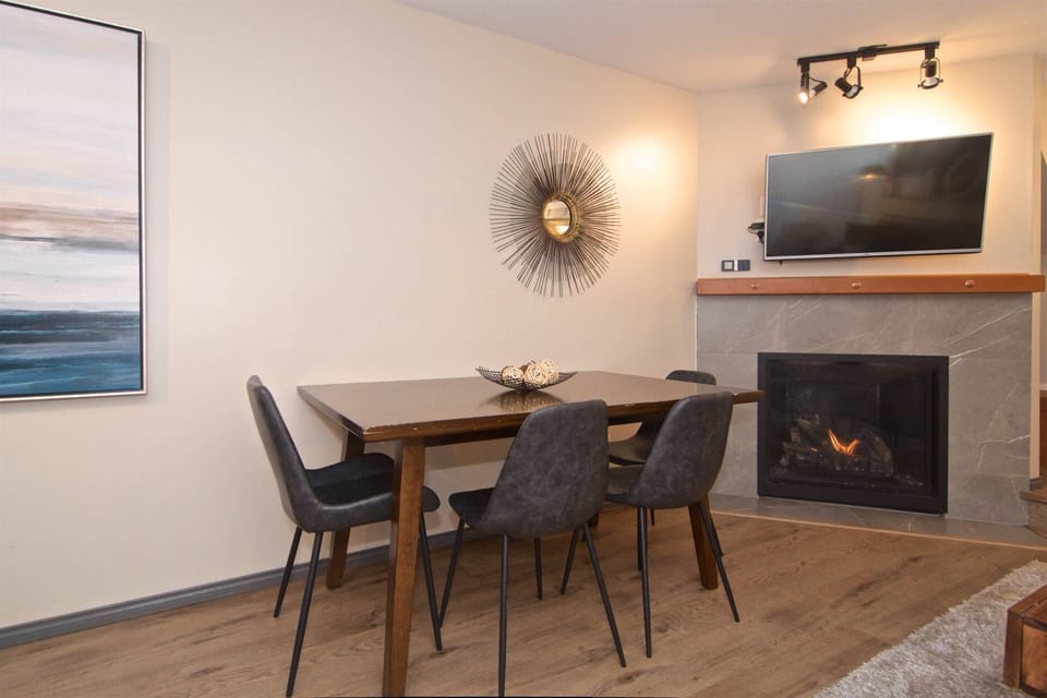Living area showing Gas Fireplace and 48" TV