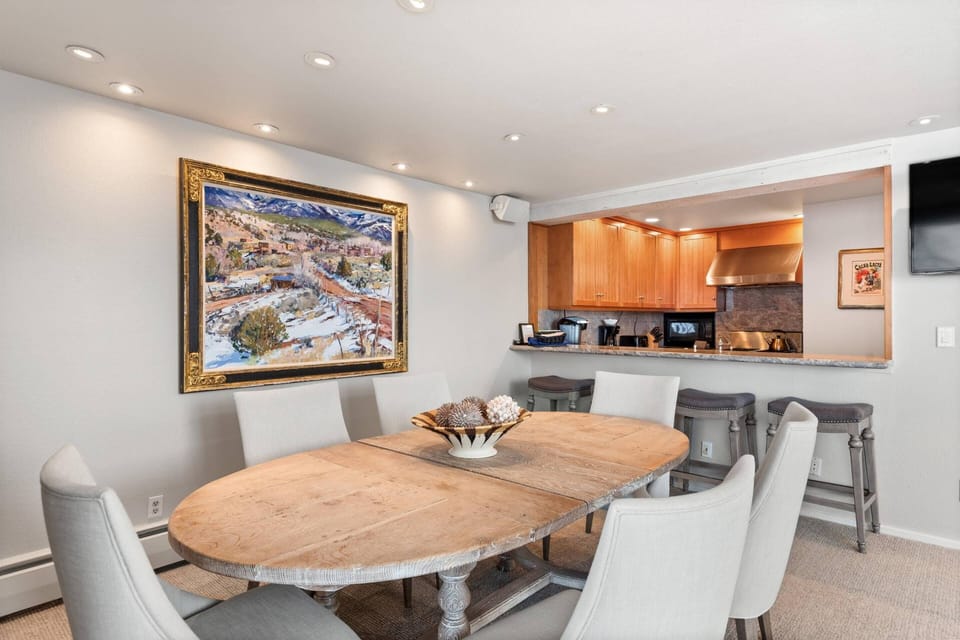 Seating for 10 at the counter and dining table.  A perfect spot for a full dinner, light breakfast or apres ski snack.