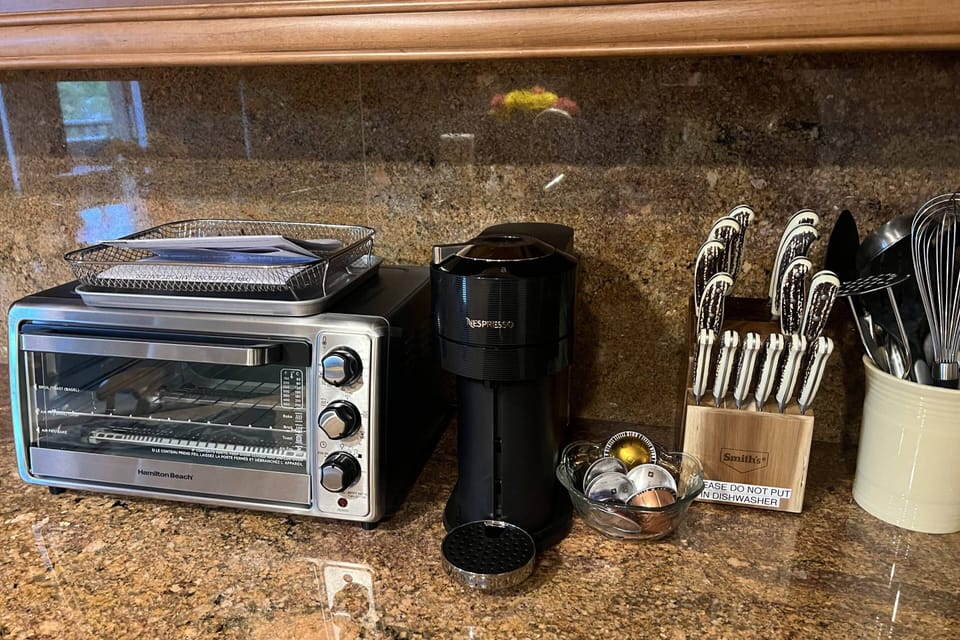 A Nespresso machine is provided for your morning coffee time enjoyment!