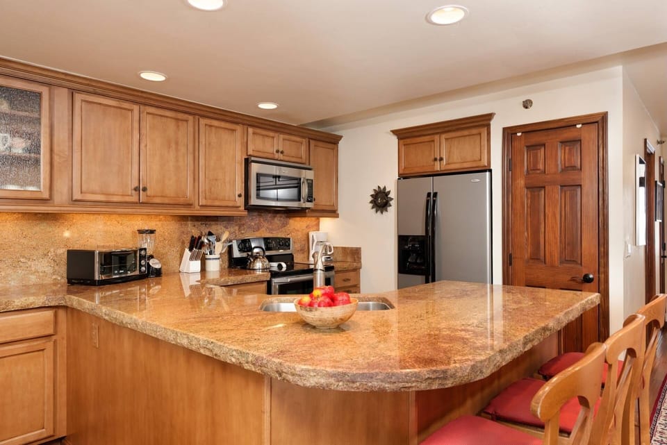 A fully stocked kitchen to accommodate all your dining needs.  Enjoy coffee at the breakfast bar in the morning before starting the days adventures.
