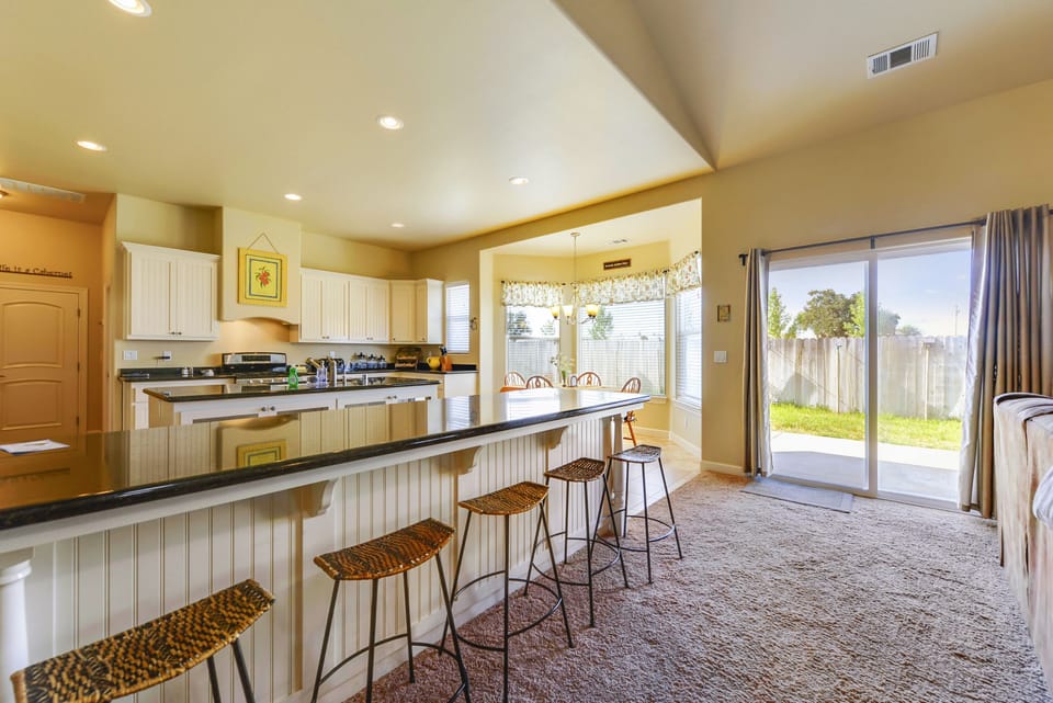 Bar seating at the Kitchen, just off the large living room