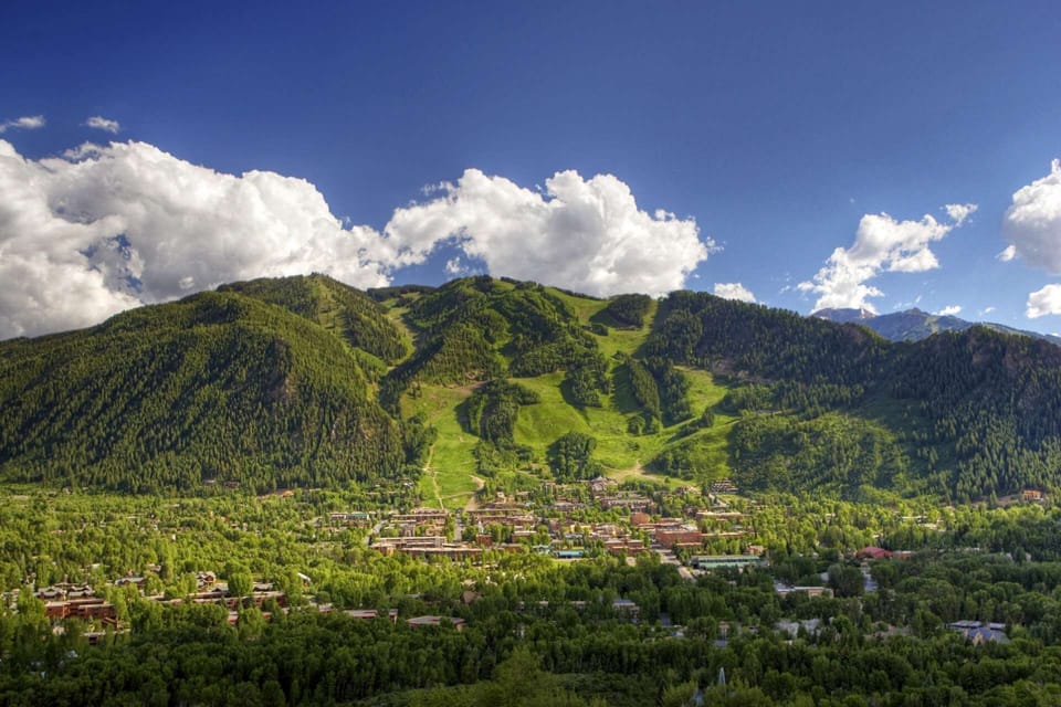 The town of Aspen sits right at the base of Aspen Mountain.  Photo courtesy Aspen Chamber Resort Association, Jeremy Swanson
