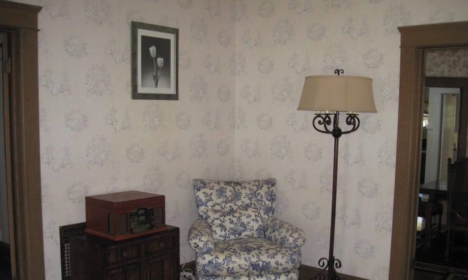 Floral armchair creates a relaxed reading nook
