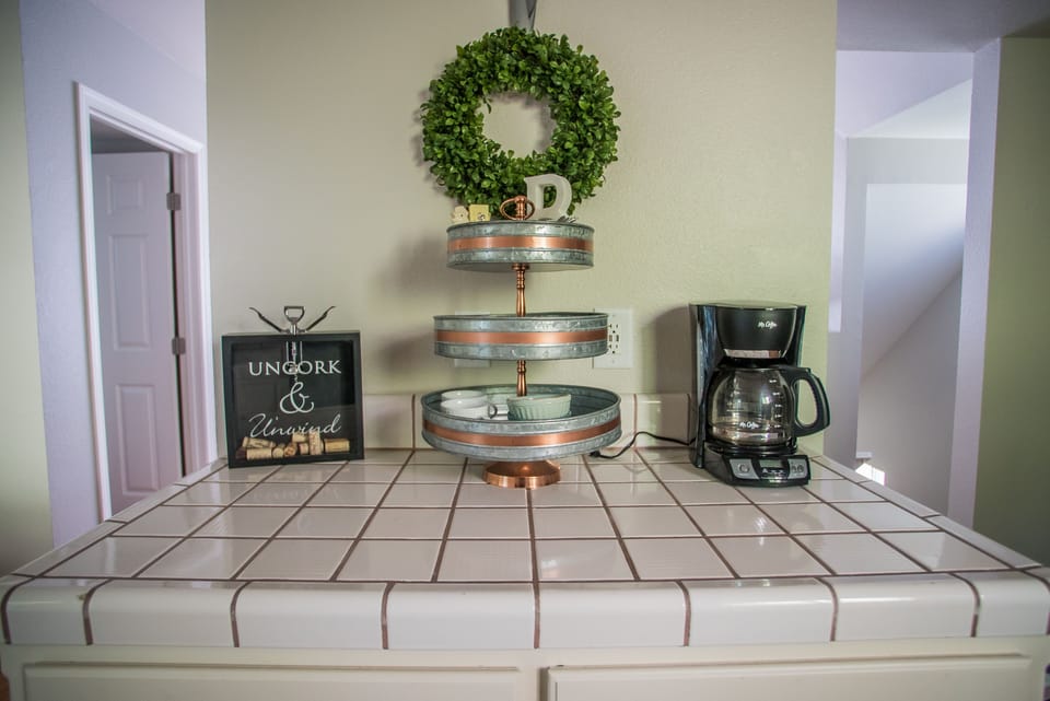 Coffee bar includes drip maker, Keurig machine, pods, ground cof