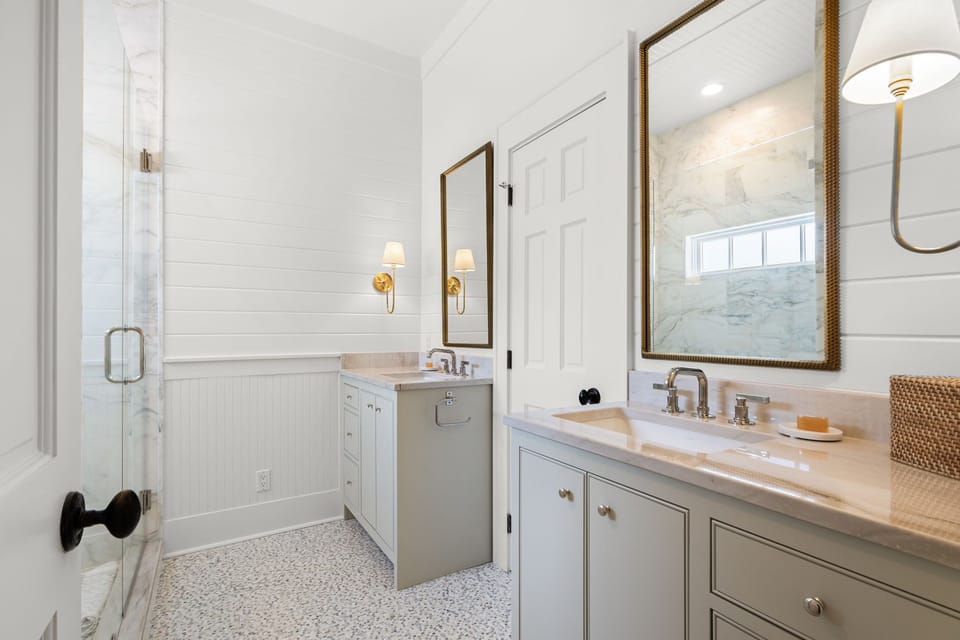 Primary Bath has walk-in shower & dual vanities