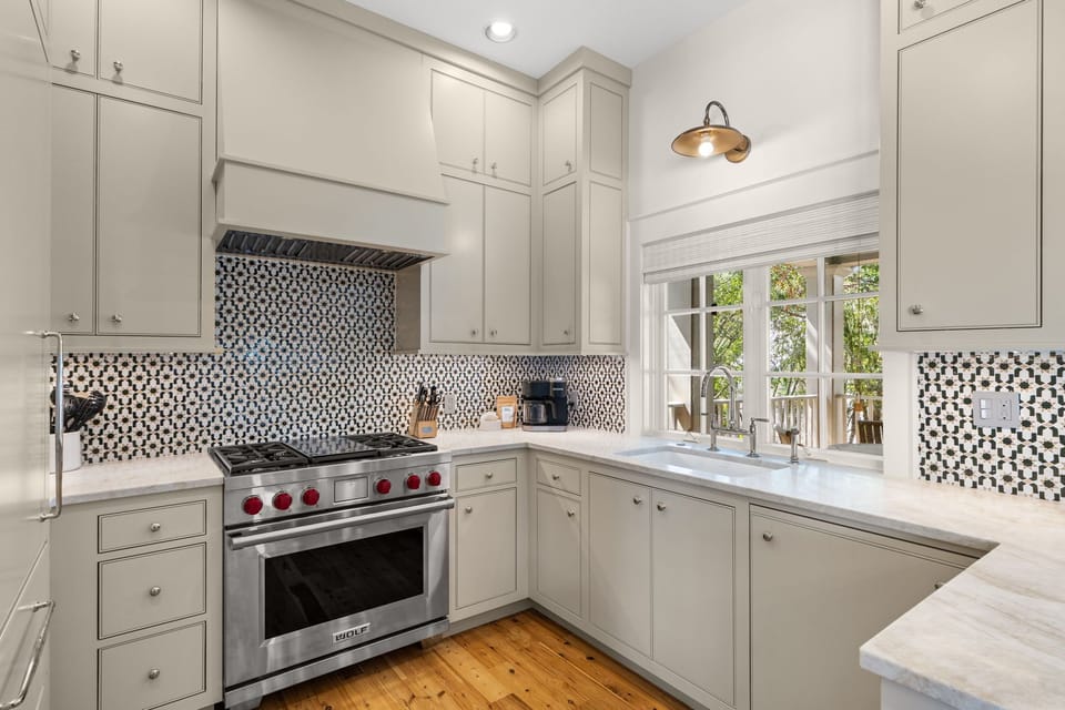 Designer tile backsplash with stainless range