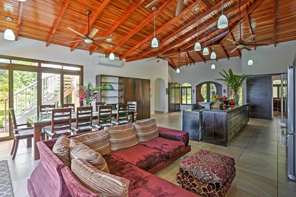 Upon entering, the modern decor and 20-foot vaulted hardwood ceilings greet you. The plush sectional sofa offers a comfortable place to relax where you can watch a DVD on the large flat-screen TV.