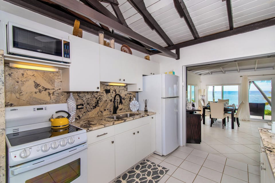 Full kitchen with modern appliances. A small grocery store is 5-minutes away. 