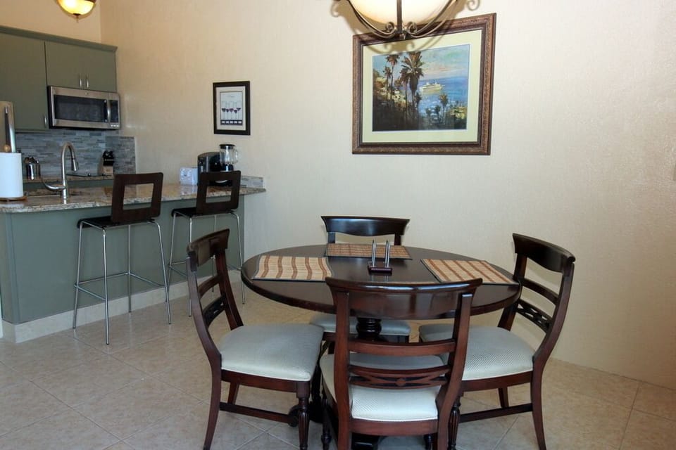 Dining area opens to kitchen.