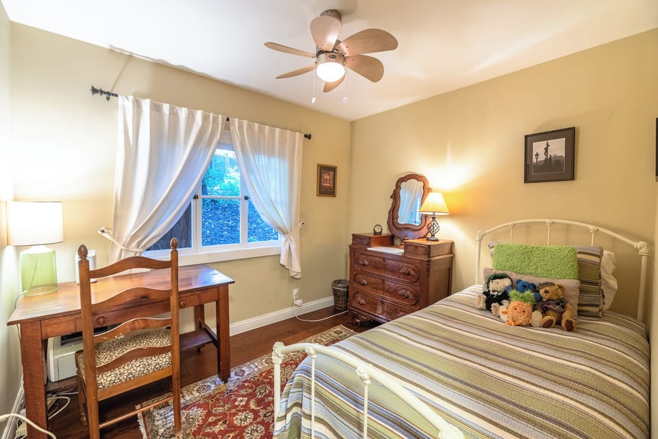 Bedroom 3 includes a twin bed and desk