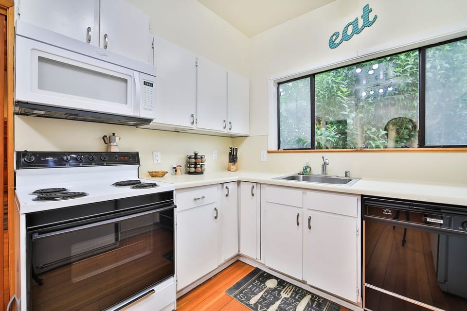 Spacious fully stocked kitchen ready for your culinary creations