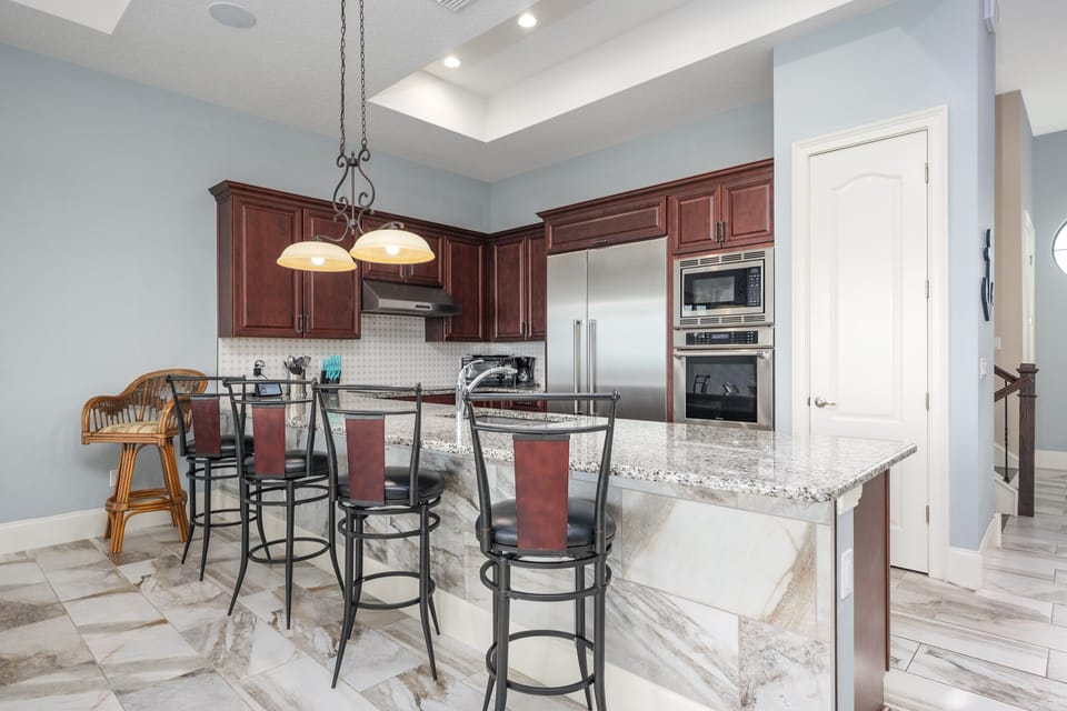 Fully Equipped Kitchen - Breakfast Bar Seating for Five - Second Floor