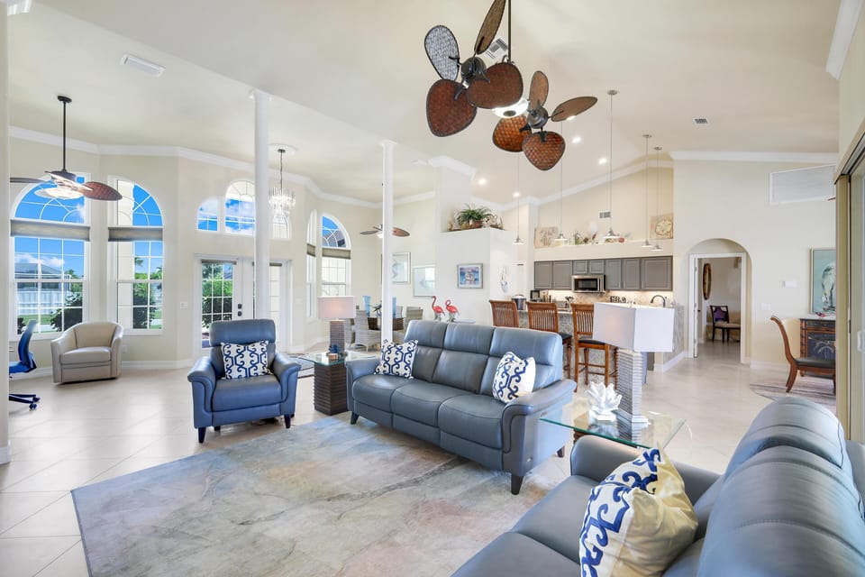 Spacious living room with abundant natural light and elegant decor