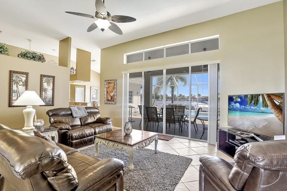 The open plan Living area with views over the pool deck