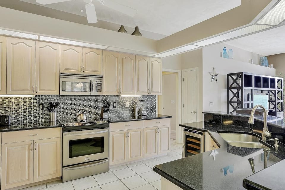 The large Kitchen overlooks the Living area