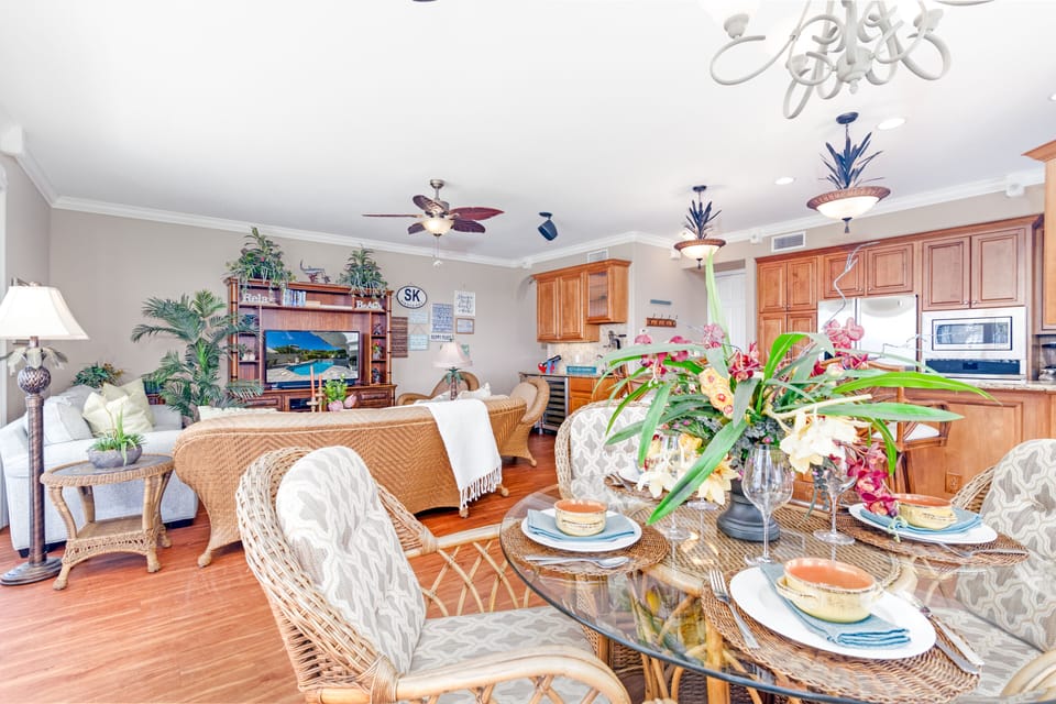From morning breakfast to movie nights, enjoy a full view of the open-concept kitchen, dining, and living space.