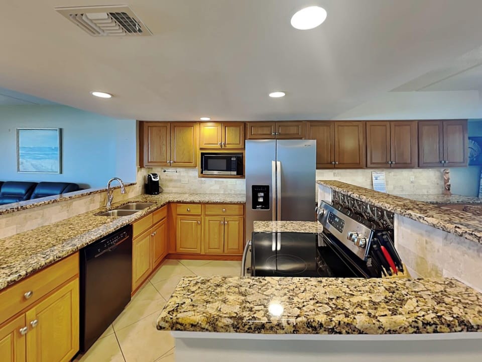 Fully Equipped Kitchen with Stainless Steel Appliances