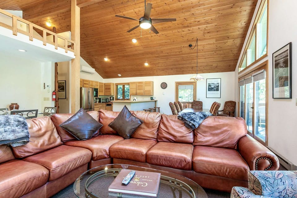 Ample seating with this plush leather sofa.