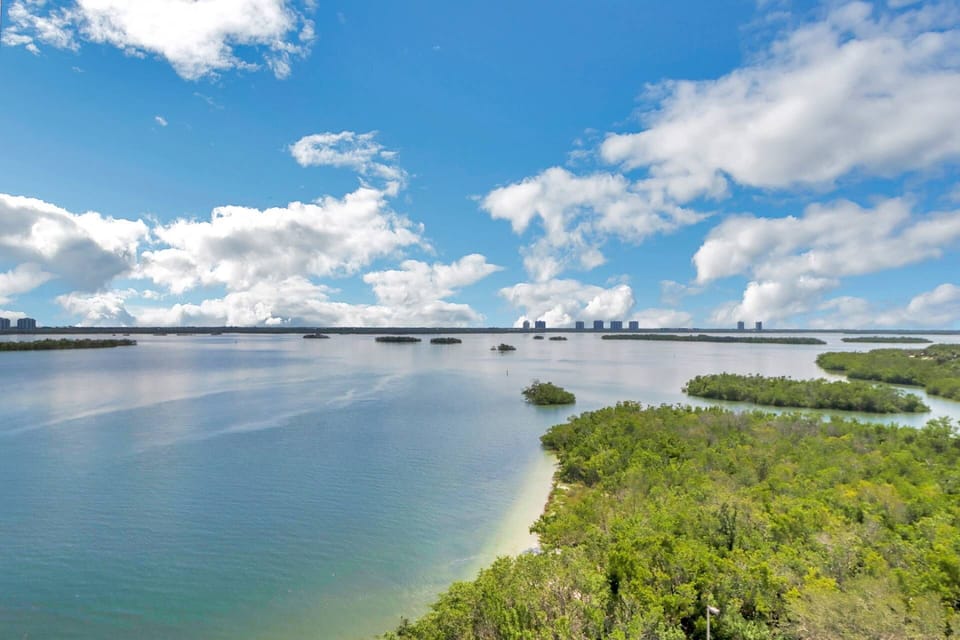 Enjoy the view from the 9th floor balcony, or walk the private shoreline during low tide; you'll love the location of your Lovers Key Suite.