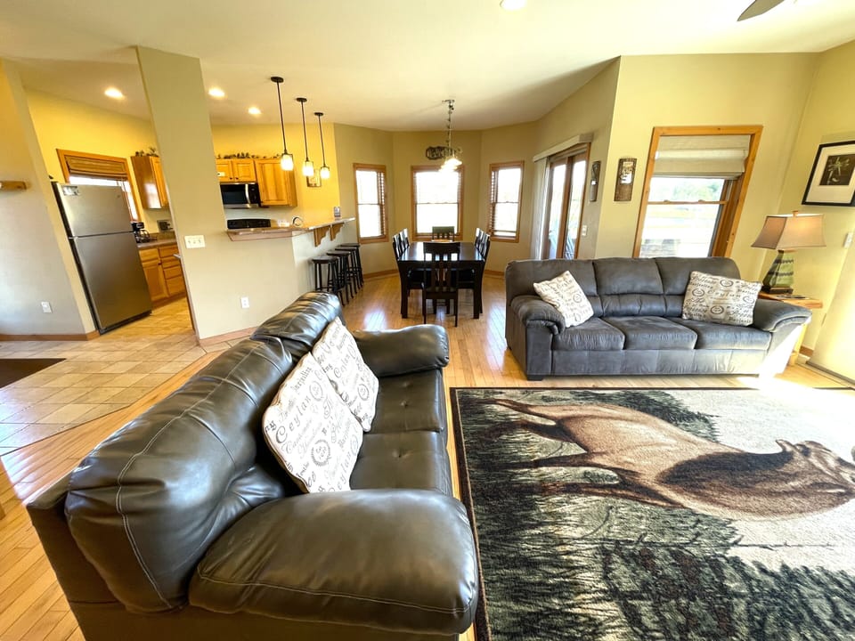 Living Room with Cozy Seating, Queen Sofa Sleeper, TV & Fireplace