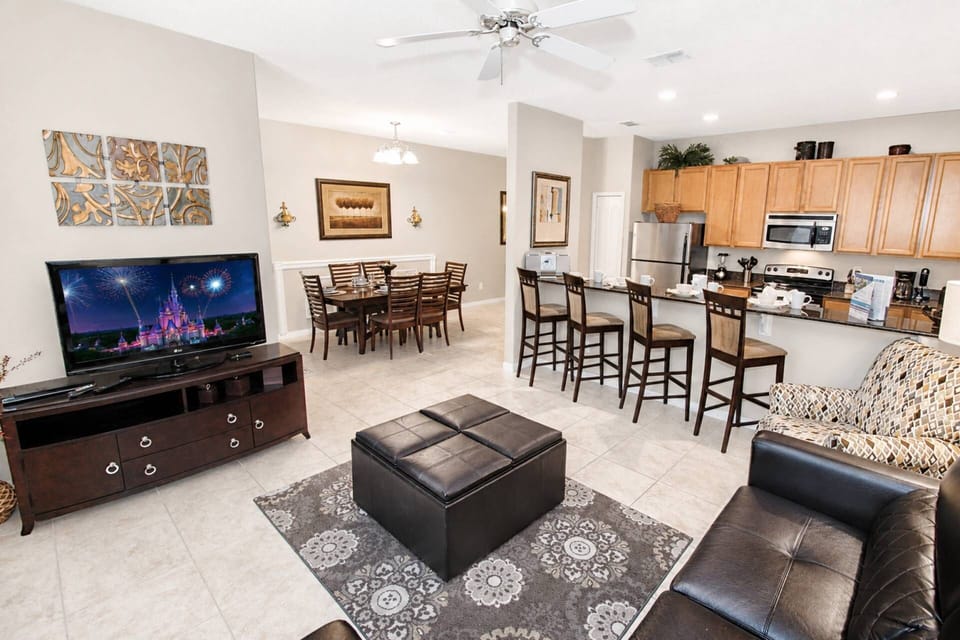 Open ground floor plan with Living room, Dining Room and Kitchen central to the rear patio and private pool!