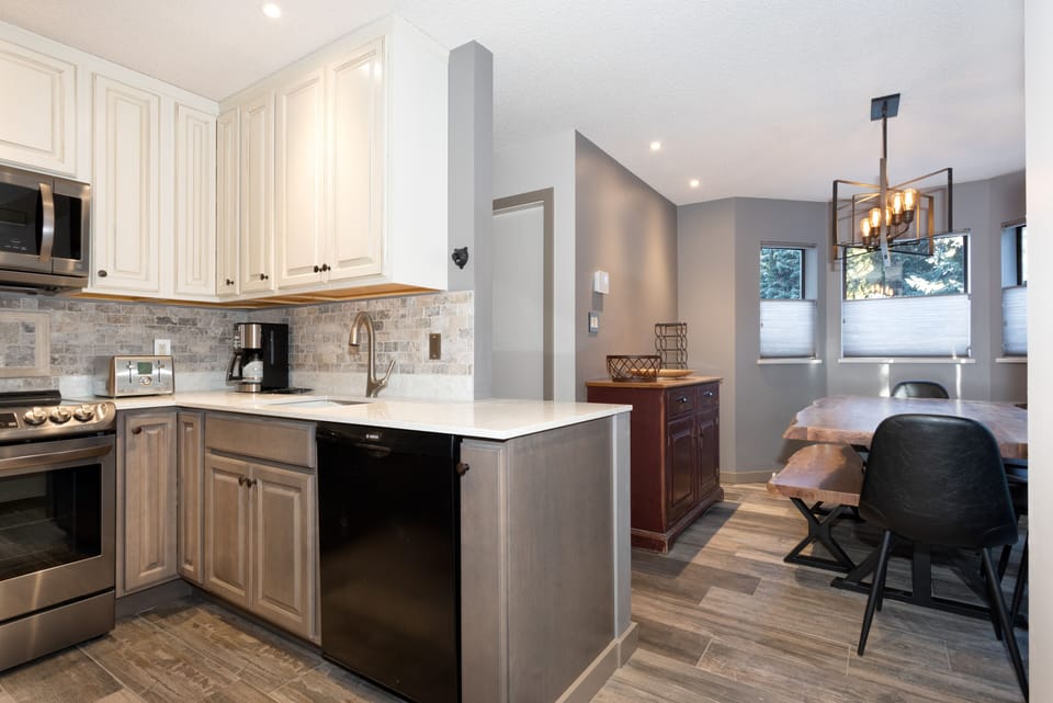 Open Kitchen with access to Dining area! - Easy access from the kitchen to the dining area!