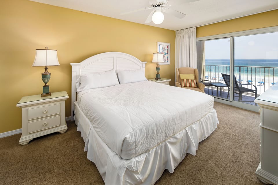 Master Bedroom - Relax in the rocking recliner, enjoying all the sites of the Emerald Coast!