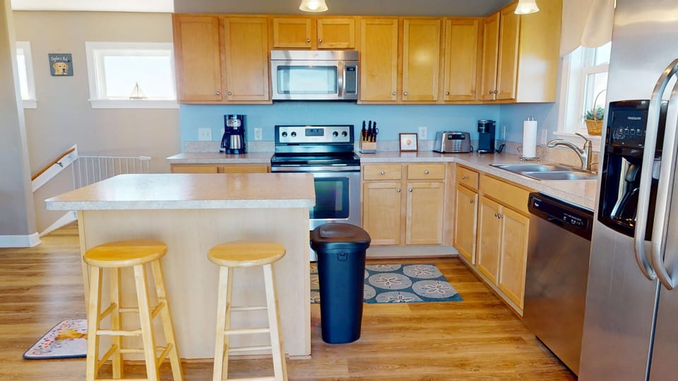 Kitchen and island - Kitchen and island at Summer Paws vacation rental, Carova Beach 4x4 Northern Outer Banks NC