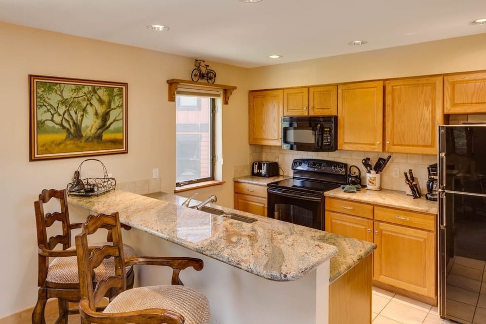 Fully Equipped Kitchen with Granite Countertops