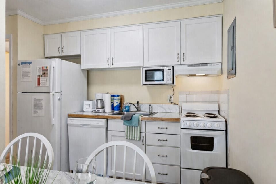 This kitchen is fully equipped: Plates, cups, silverware, basic prep items for cooking small to large meals.