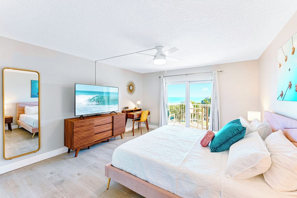 Wake up to stunning ocean views from the comfort of your serene master bedroom