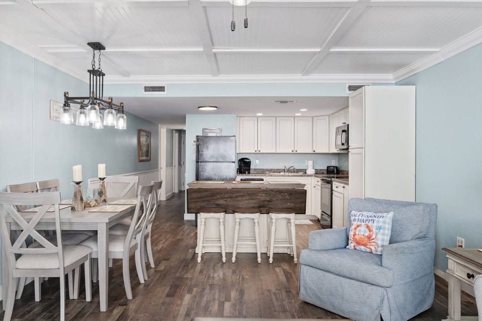 Living area into Dining and Kitchen