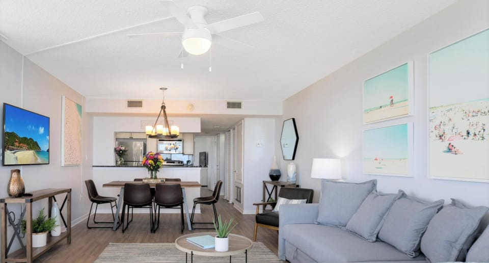 Spacious living area with stylish decor and an open-concept design